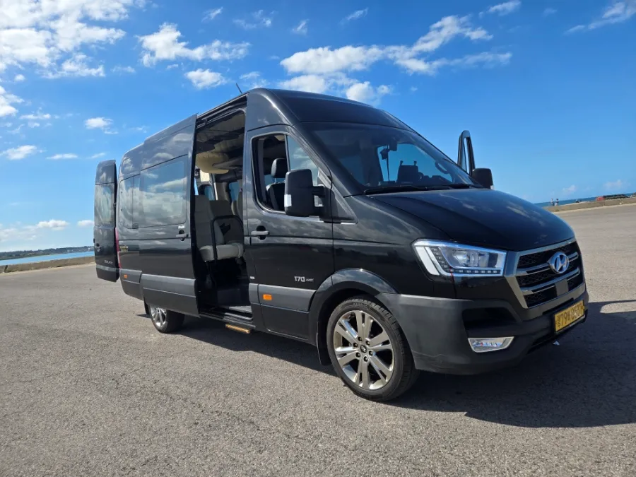 Van taxi at Jeju Airport for travelers with large luggage