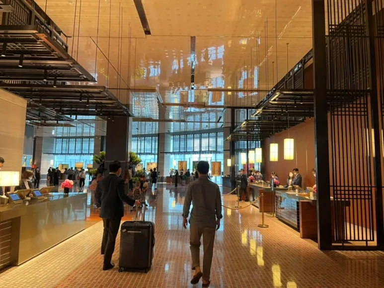 Traveler arriving at a hotel in Jeju after flying from Seoul